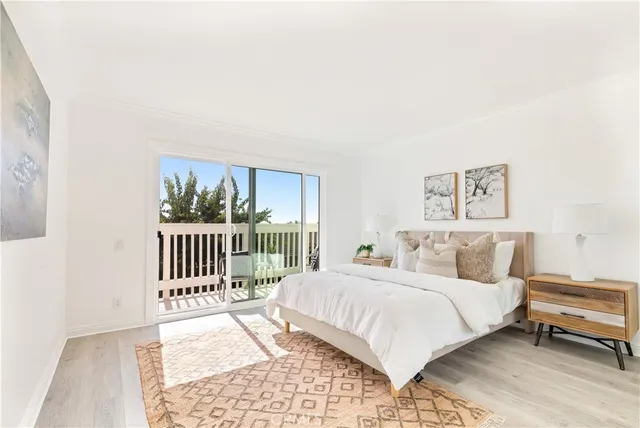 a bedroom with a bed and a table