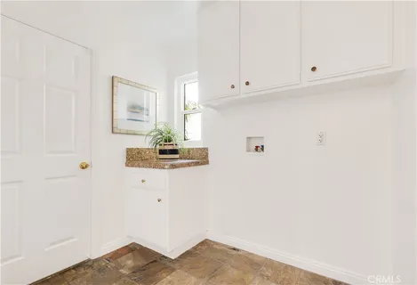 a view of kitchen and utility room