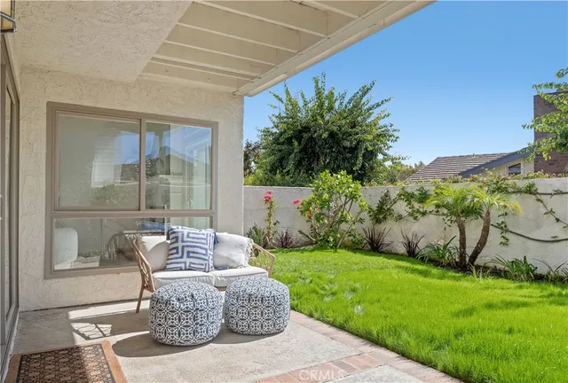 a garden view with a seating space