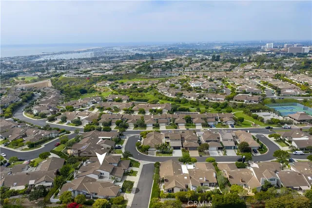 an aerial view of a city with lots of residential buildings