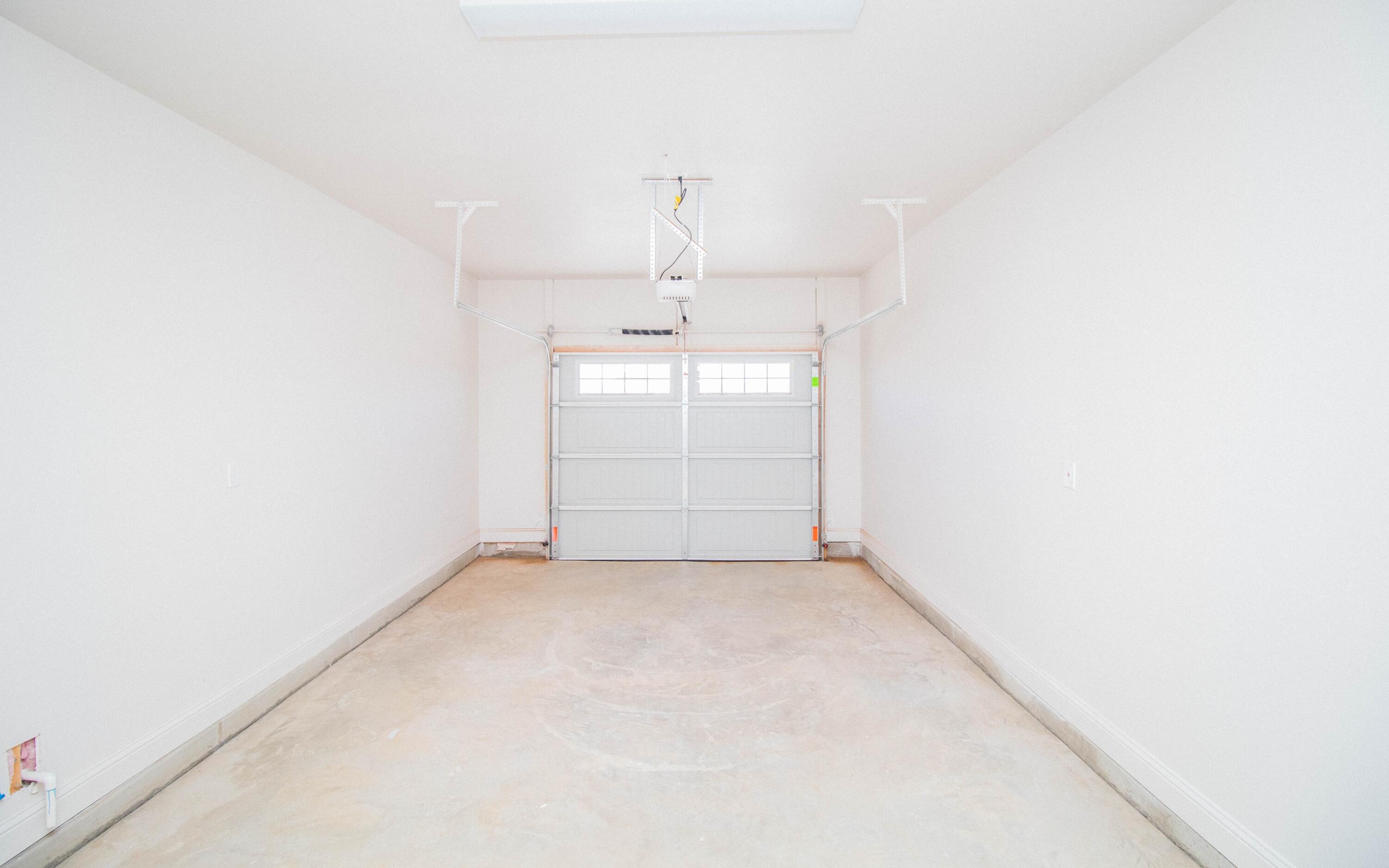 1613 102nd Street Lubbock, TX 79423 - Photo 18 of 18 an empty room with a cabinet and mirrors