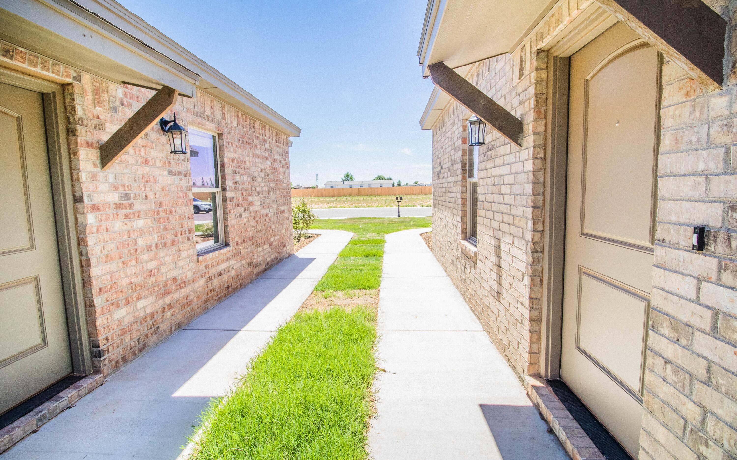 1613 102nd Street Lubbock, TX 79423 - Photo 2 of 18 a view of a balcony with chairs and wooden floor