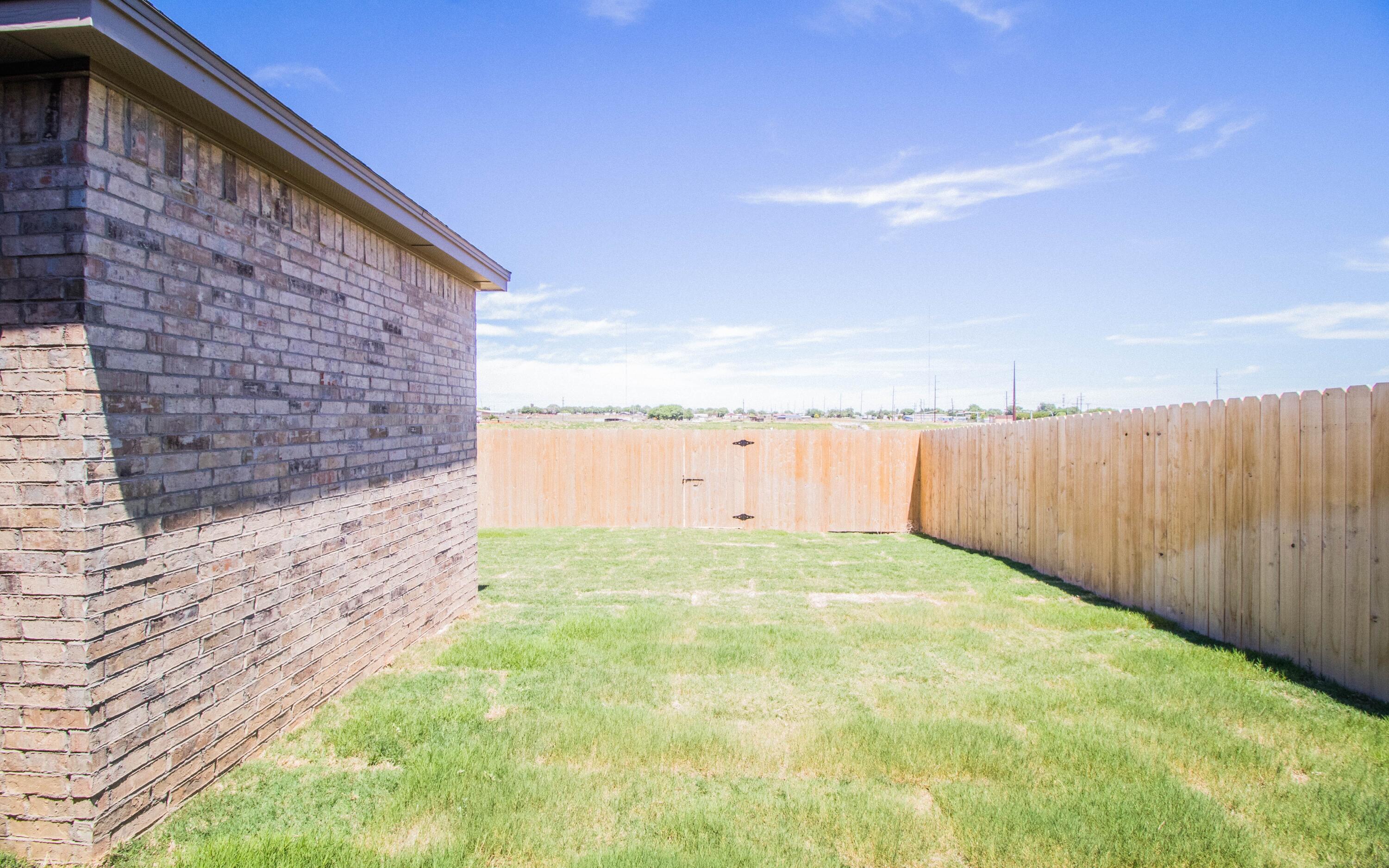 1613 102nd Street Lubbock, TX 79423 - Photo 8 of 18 a view of wooden floor and lake view