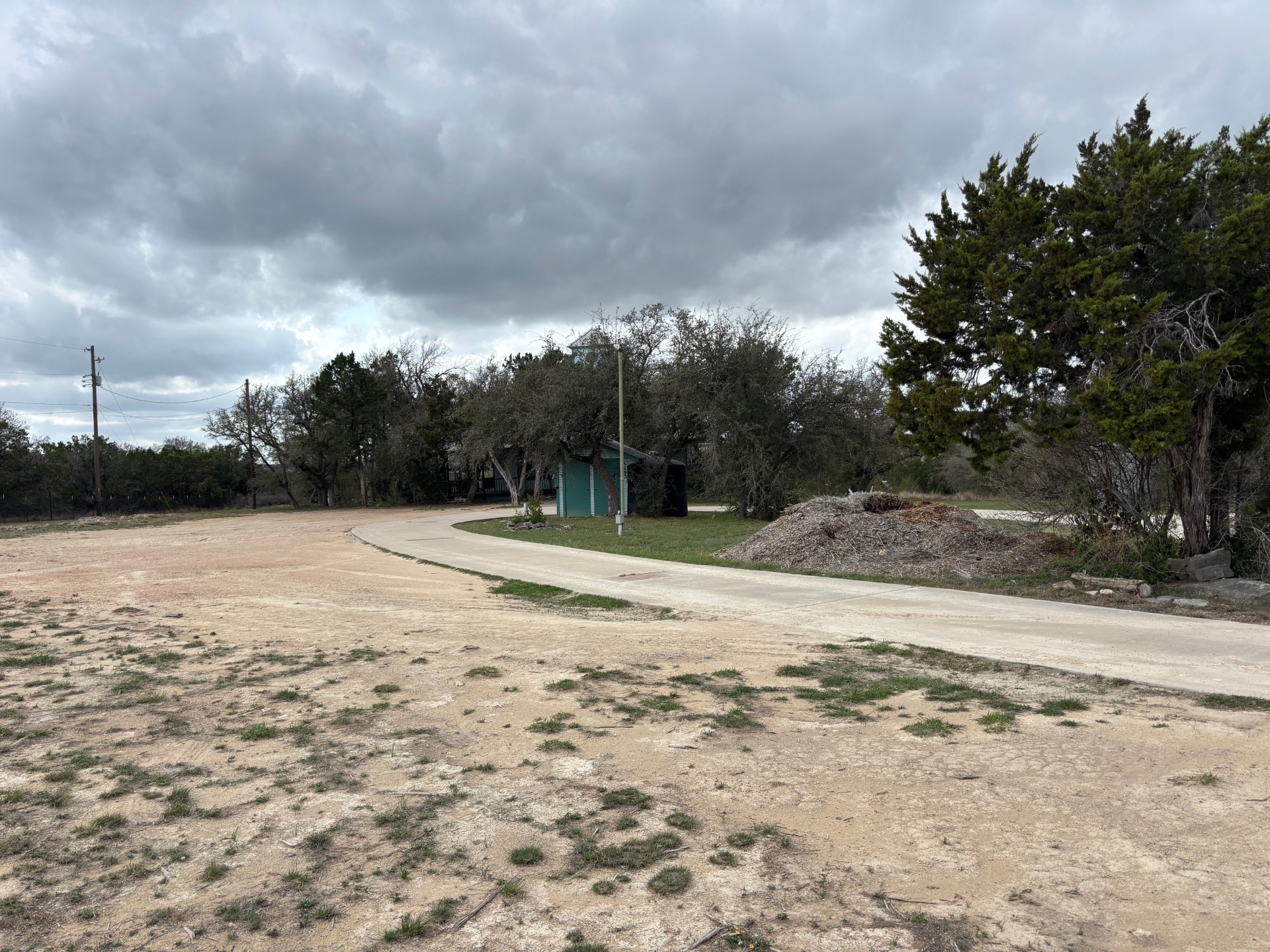 15401 Lariat Trail Austin, TX 78734 - Photo 19 of 23 View of community with dirt driveway