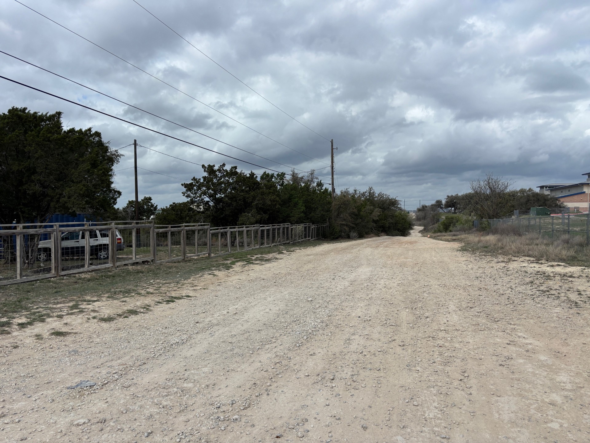 15401 Lariat Trail Austin, TX 78734 - Photo 7 of 23 View of dirt / gravel road with a rural view