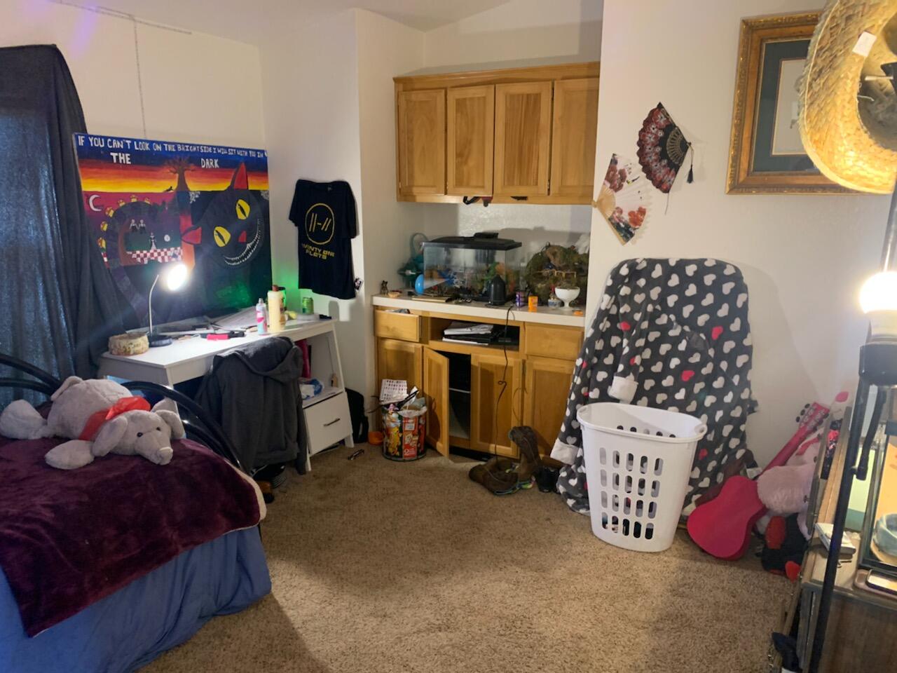 20567 Plymire Road Red Bluff, CA 96080 - Photo 11 of 20 a bedroom with a bed and wooden floor