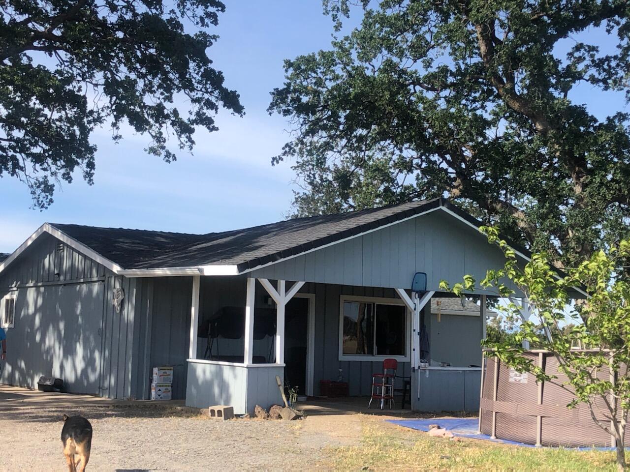 20567 Plymire Road Red Bluff, CA 96080 - Photo 2 of 20 a view of a house with a yard