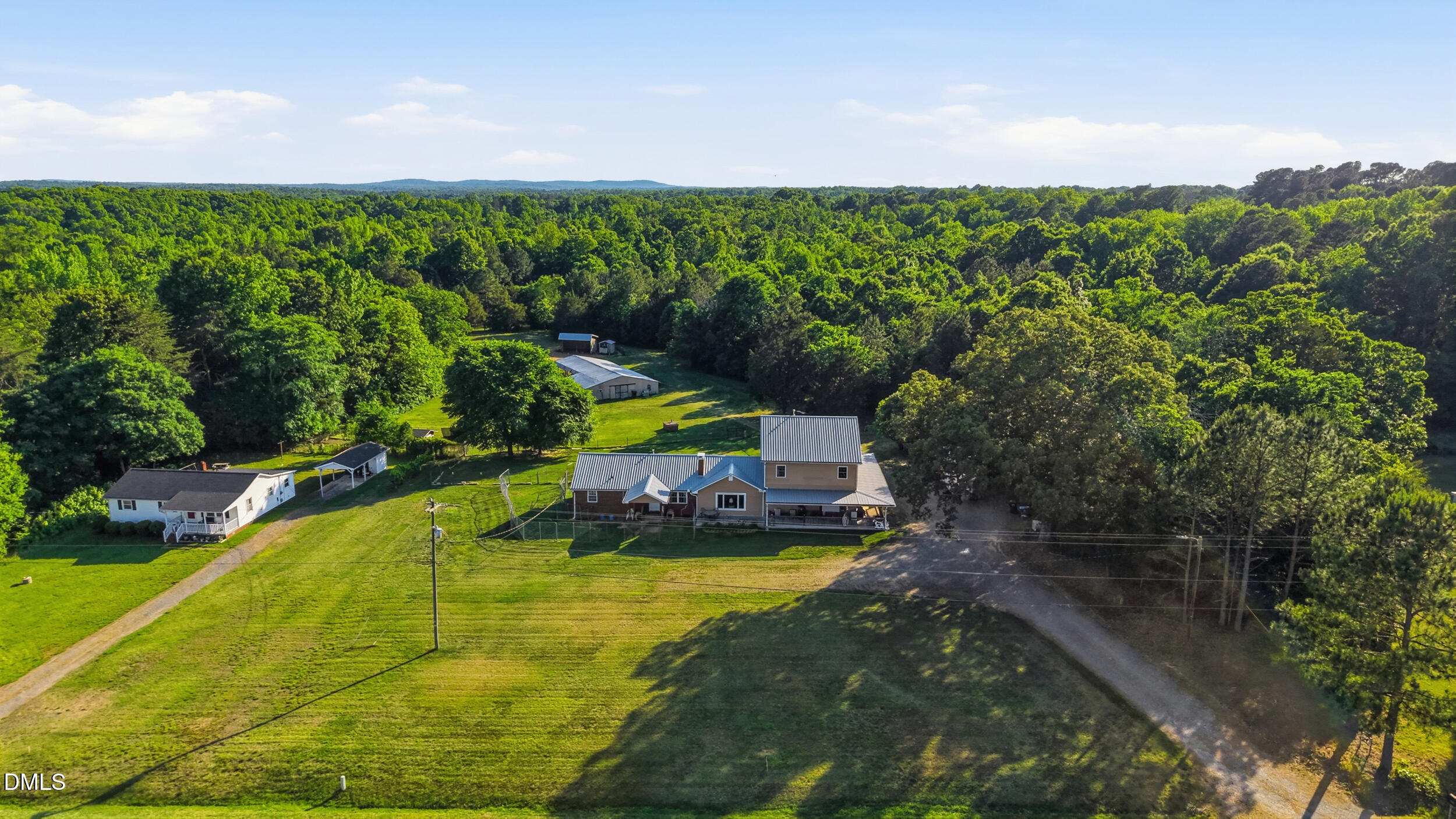 2631 South Jim Minor Road Haw River, NC 27258 - Photo 53 of 62 a view of a swimming pool with a yard