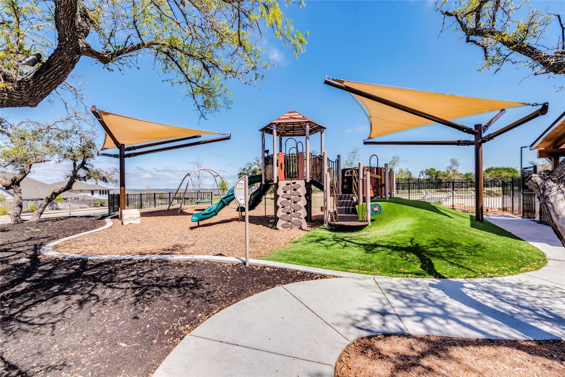 174 Delaware Mountains Terrace Dripping Springs, TX 78620 - Photo 29 of 30 The community playground is another wonderful amenity at Big Sky Ranch!