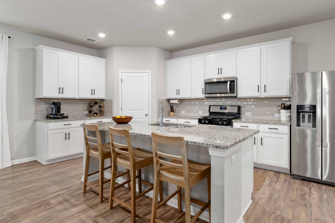 174 Delaware Mountains Terrace Dripping Springs, TX 78620 - Photo 6 of 30 Refrigerator is included in the lease!