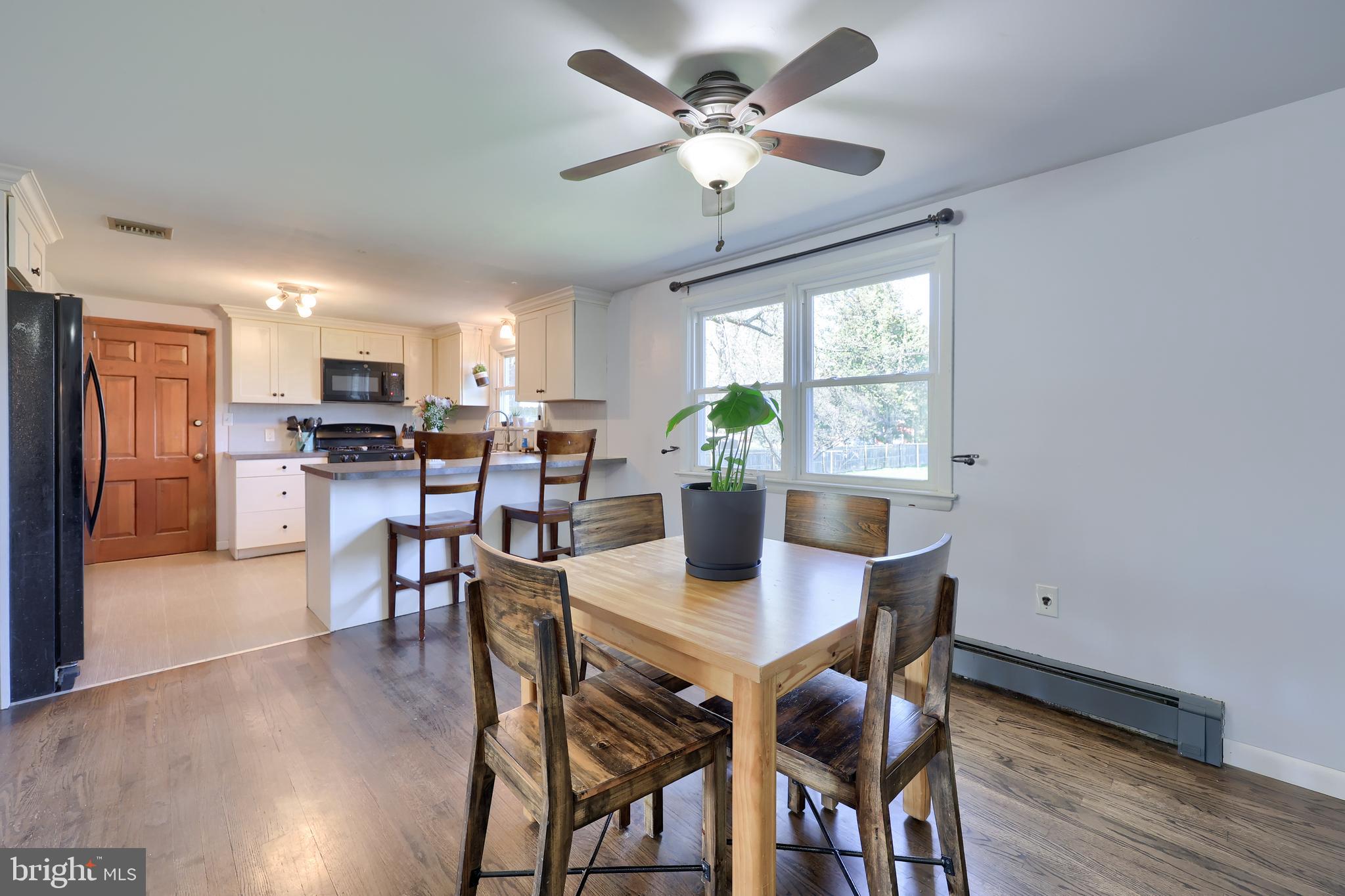 2033 Robindale Avenue Lancaster, PA 17601 - Photo 12 of 47 a view of a dining room with furniture window and wooden floor