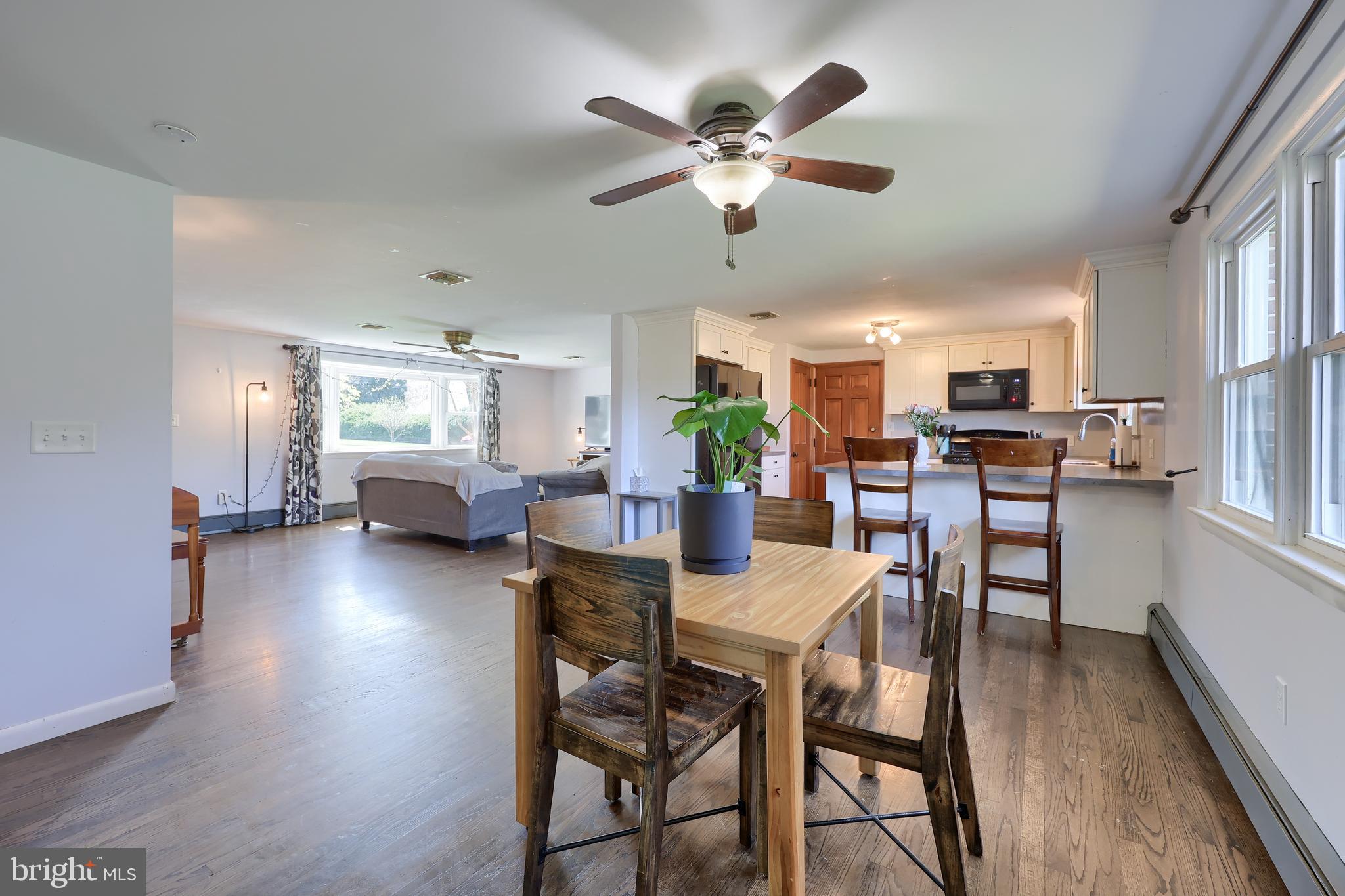 2033 Robindale Avenue Lancaster, PA 17601 - Photo 13 of 47 a view of a dining room with furniture window and wooden floor