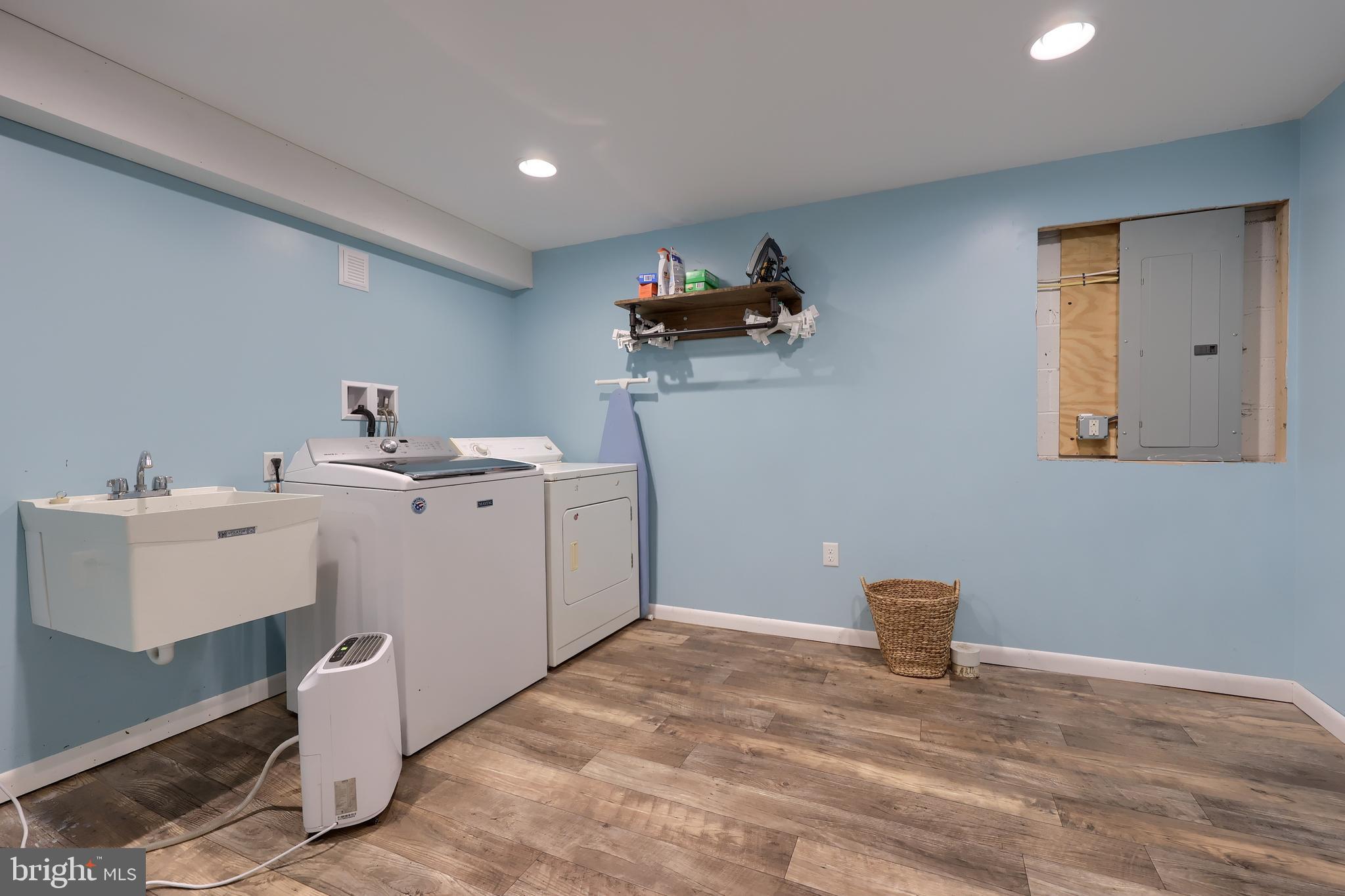 2033 Robindale Avenue Lancaster, PA 17601 - Photo 34 of 47 a view of storage and utility room with two washing machine