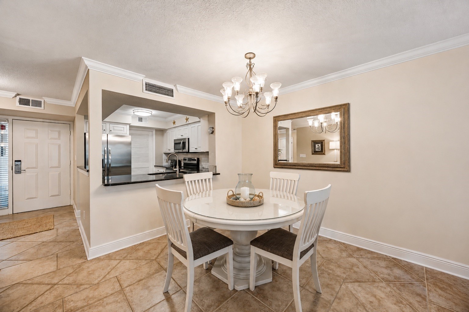 2117 Beachwood Road, Unit 2117 Fernandina Beach, FL 32034 - Photo 8 of 36 a dining room with furniture and chandelier