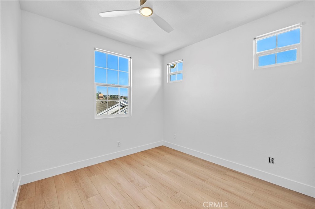27 Rinehart Road Ladera Ranch, CA 92694 - Photo 23 of 50 Upstairs bedroom with new ceiling fan, LVT flooring and paint