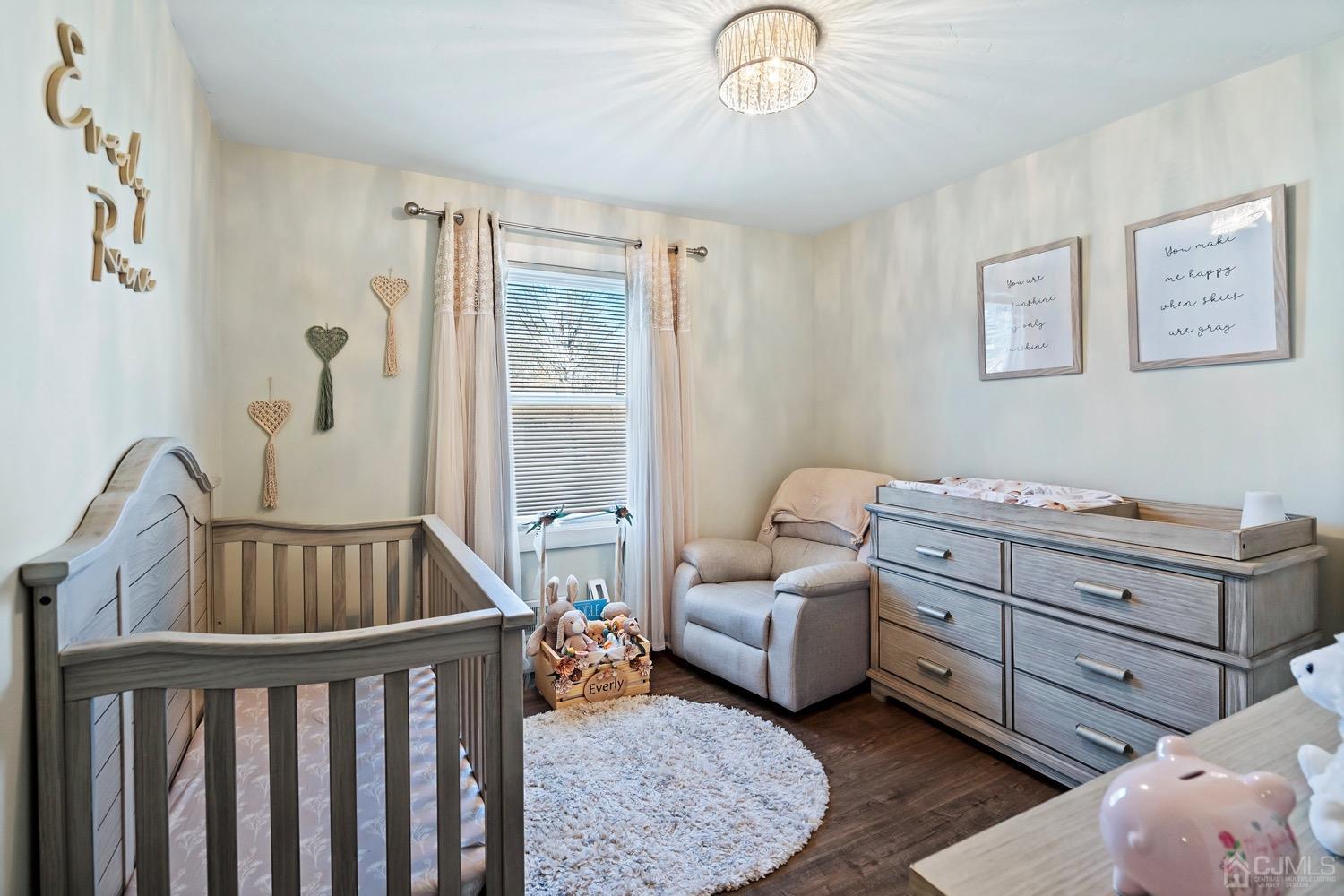 18 4th Street Barnegat, NJ 08005 - Photo 17 of 27 a bedroom with furniture and wooden floor