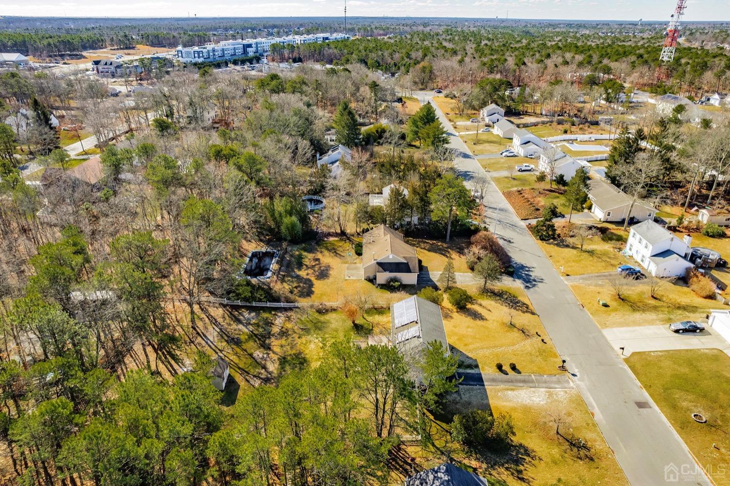 18 4th Street Barnegat, NJ 08005 - Photo 26 of 27 an aerial view of residential building with parking space
