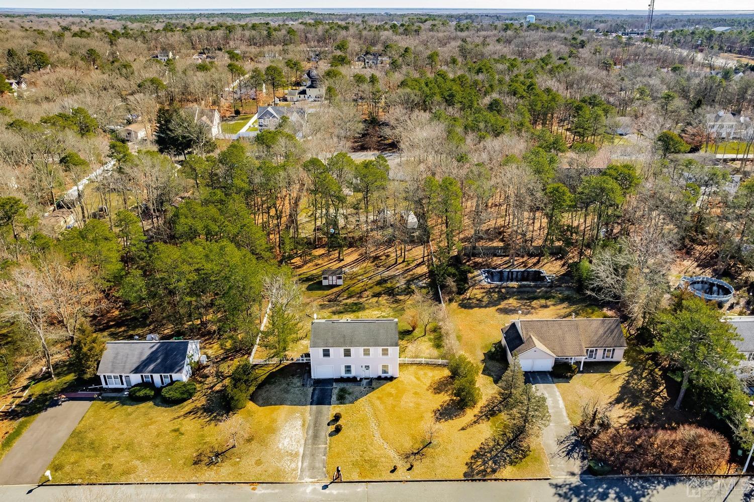 18 4th Street Barnegat, NJ 08005 - Photo 3 of 27 an aerial view of residential houses with outdoor space