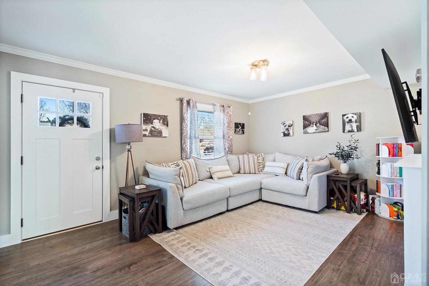 18 4th Street Barnegat, NJ 08005 - Photo 6 of 27 a living room with furniture and a wooden floor