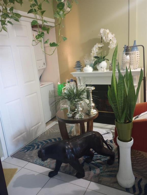 1250 East Sample Road, Unit 307 Pompano Beach, FL 33064 - Photo 9 of 11 a dining room with furniture and a potted plant