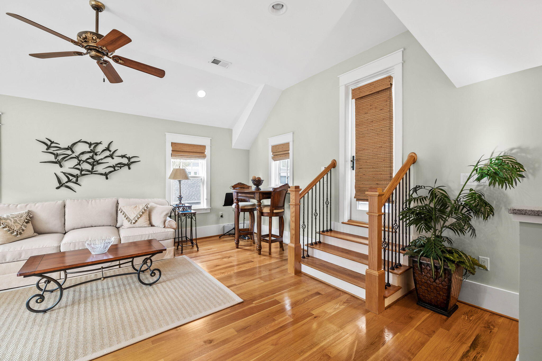 76 Tidepool Lane Watersound, FL 32461 - Photo 21 of 41 a living room with furniture and a wooden floor
