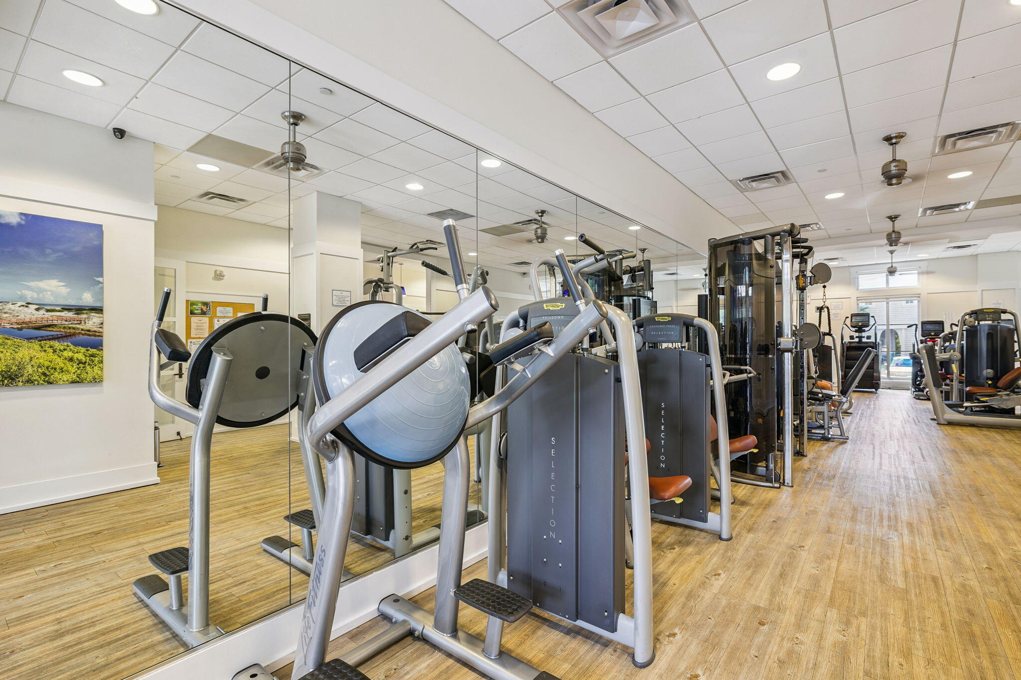 76 Tidepool Lane Watersound, FL 32461 - Photo 36 of 41 a view of a room with gym equipment