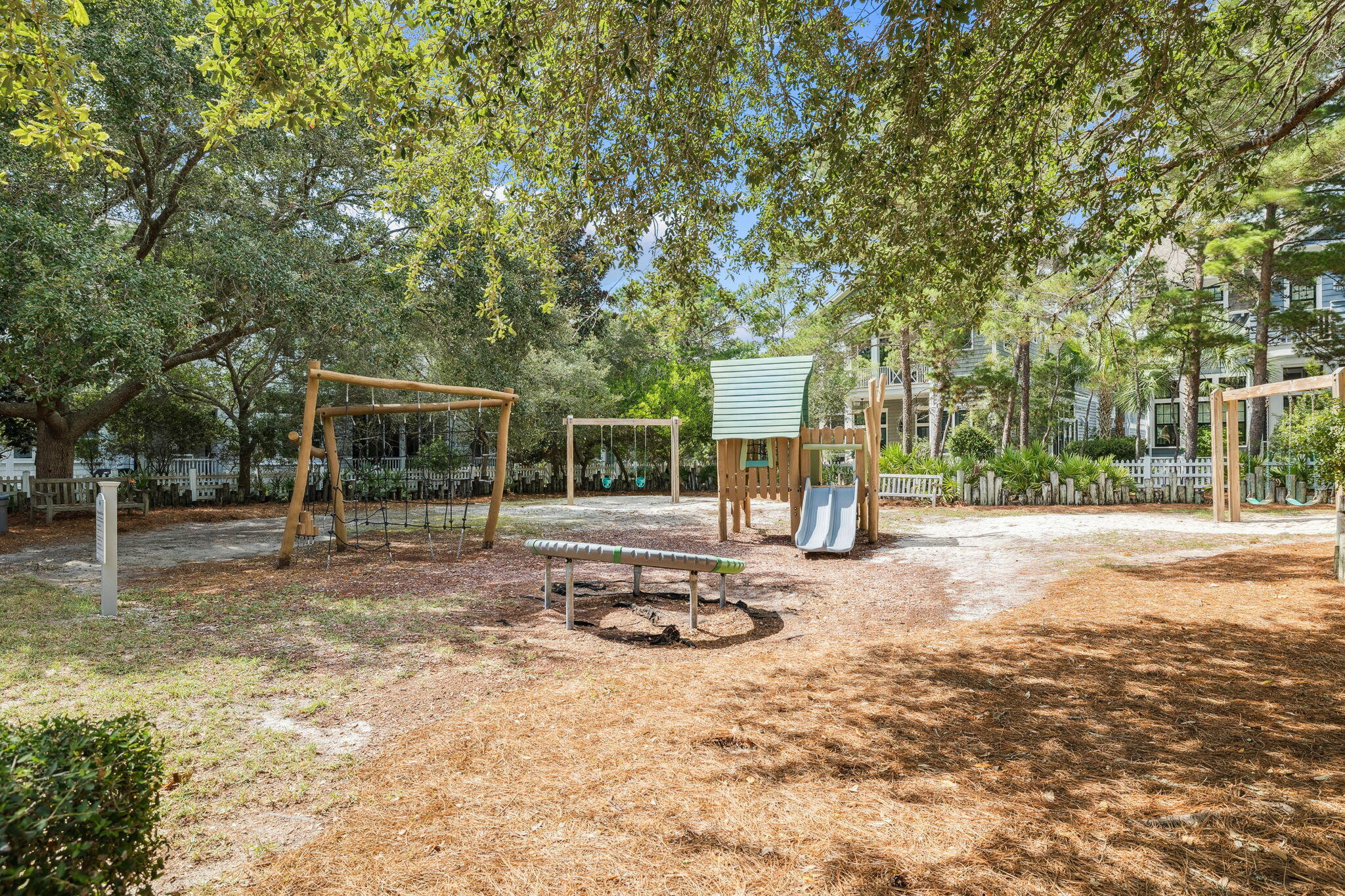 76 Tidepool Lane Watersound, FL 32461 - Photo 39 of 41 a view of a patio with a table and chairs and potted plants