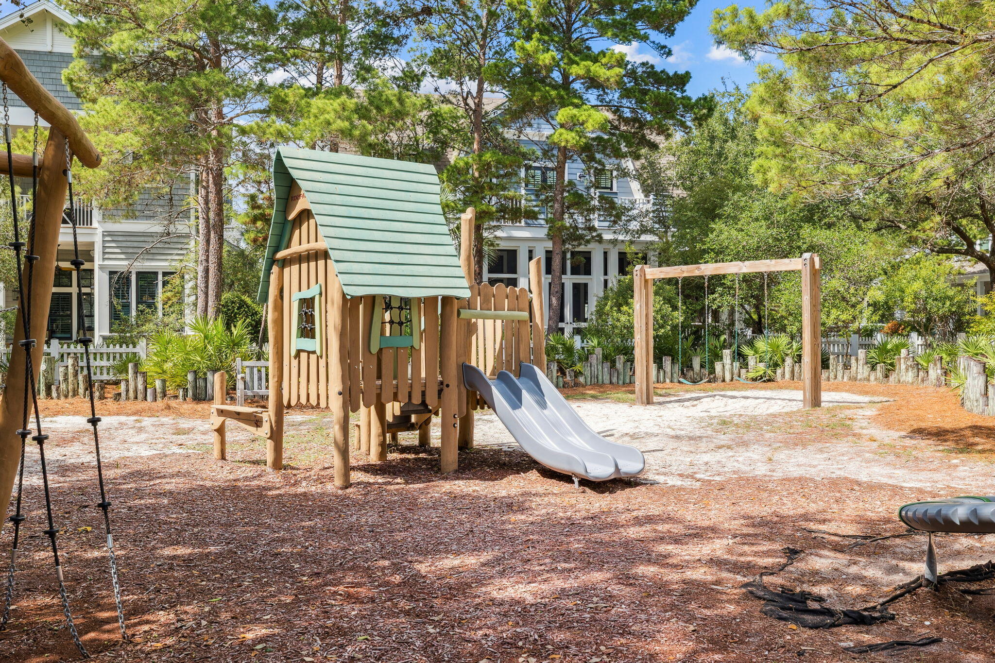 76 Tidepool Lane Watersound, FL 32461 - Photo 40 of 41 a view of a house with backyard and a tree