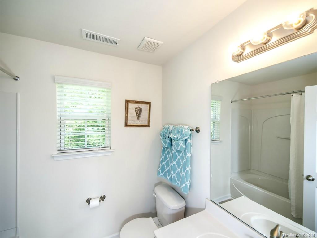 392 Wellridge Drive Fort Mill, SC 29708 - Photo 18 of 21 a bathroom with a toilet sink and shower