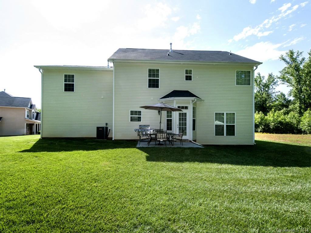 392 Wellridge Drive Fort Mill, SC 29708 - Photo 20 of 21 a front view of a house with garden