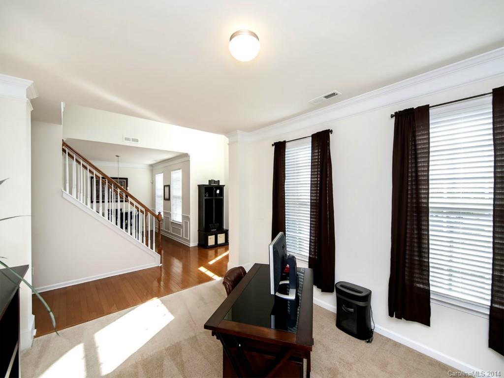 392 Wellridge Drive Fort Mill, SC 29708 - Photo 6 of 21 a living room with furniture flat screen tv and windows