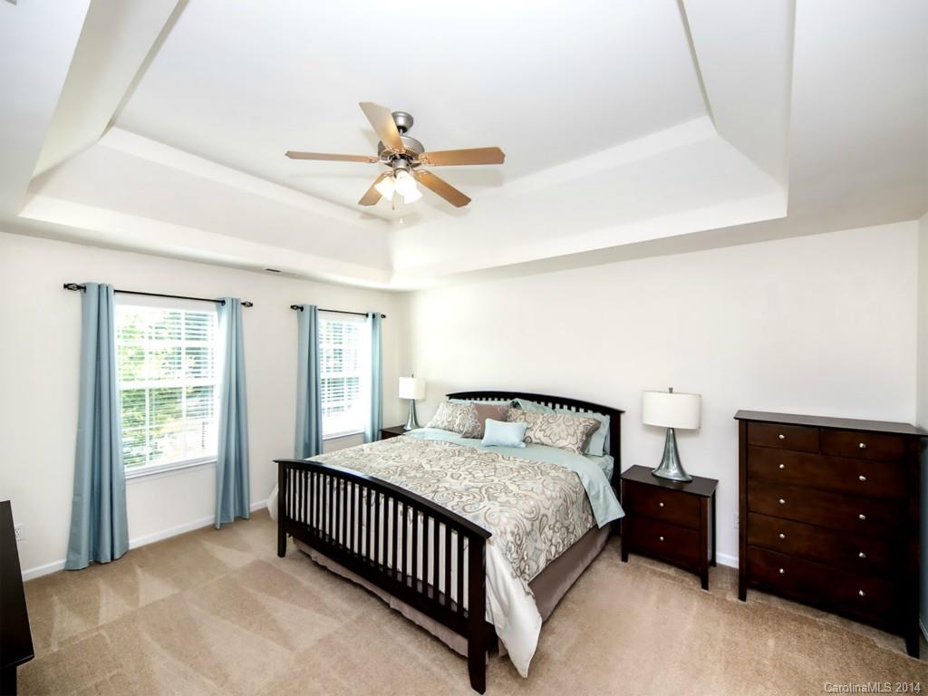392 Wellridge Drive Fort Mill, SC 29708 - Photo 10 of 21 a bedroom with a bed and a window