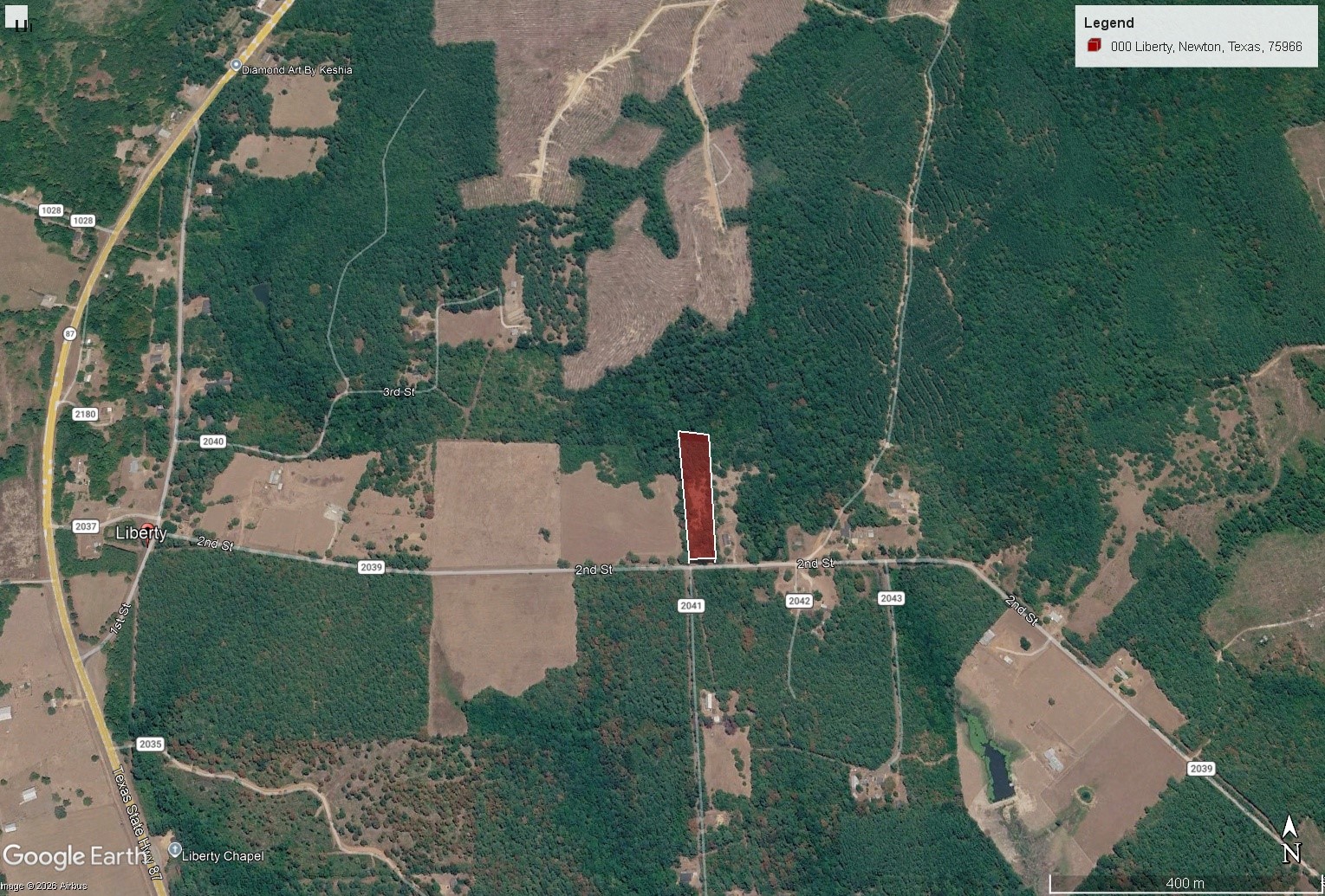 0 2nd Street Newton, TX 75966 - Photo 5 of 15 an aerial view of a house with outdoor space lake view and car parked