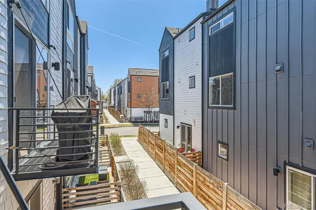 a balcony with view of living room