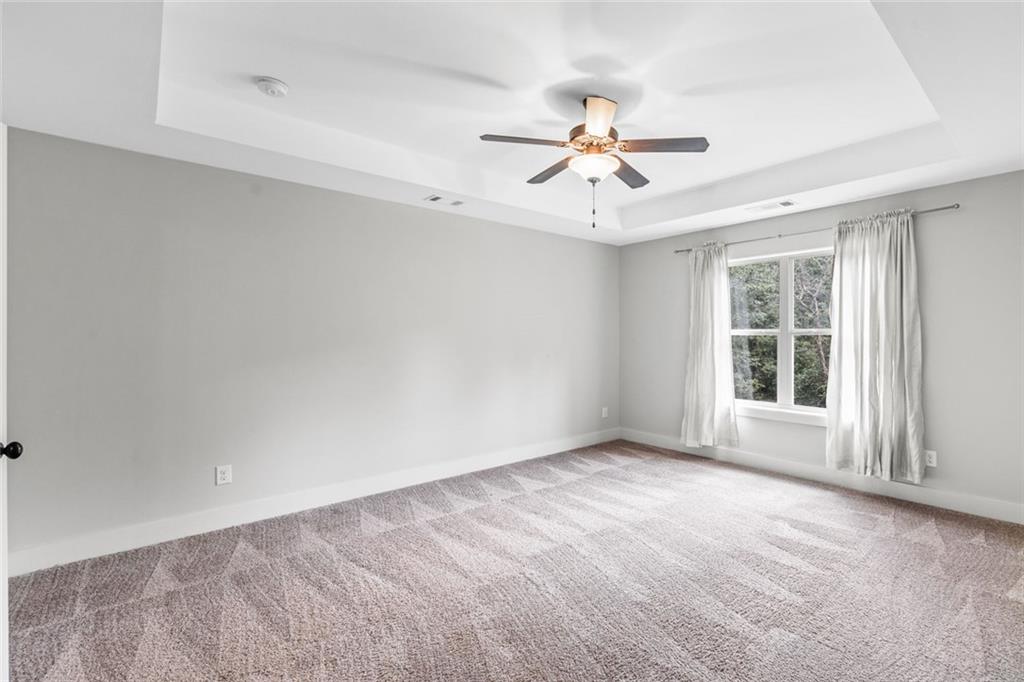 1701 Trotters Court Monroe, GA 30656 - Photo 23 of 41 a view of an empty room with a window