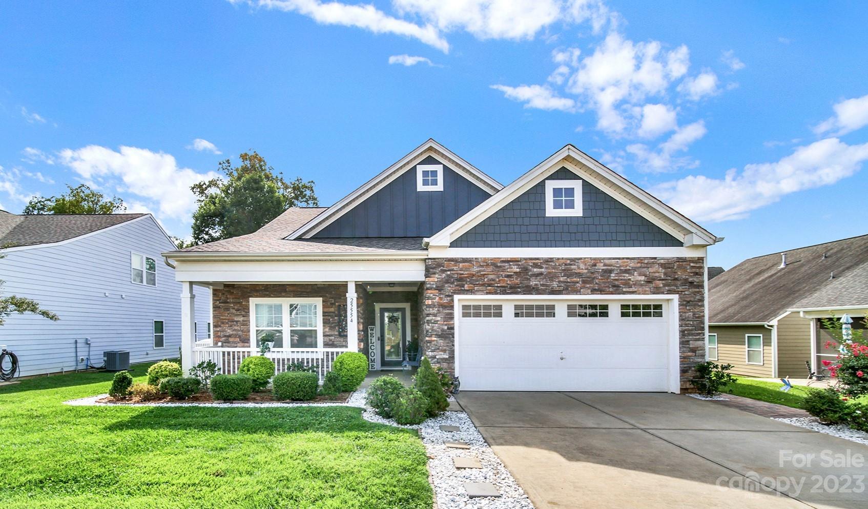 25554 Seagull Drive Lancaster, SC 29720 - Photo 1 of 33 a front view of a house with a yard and garage