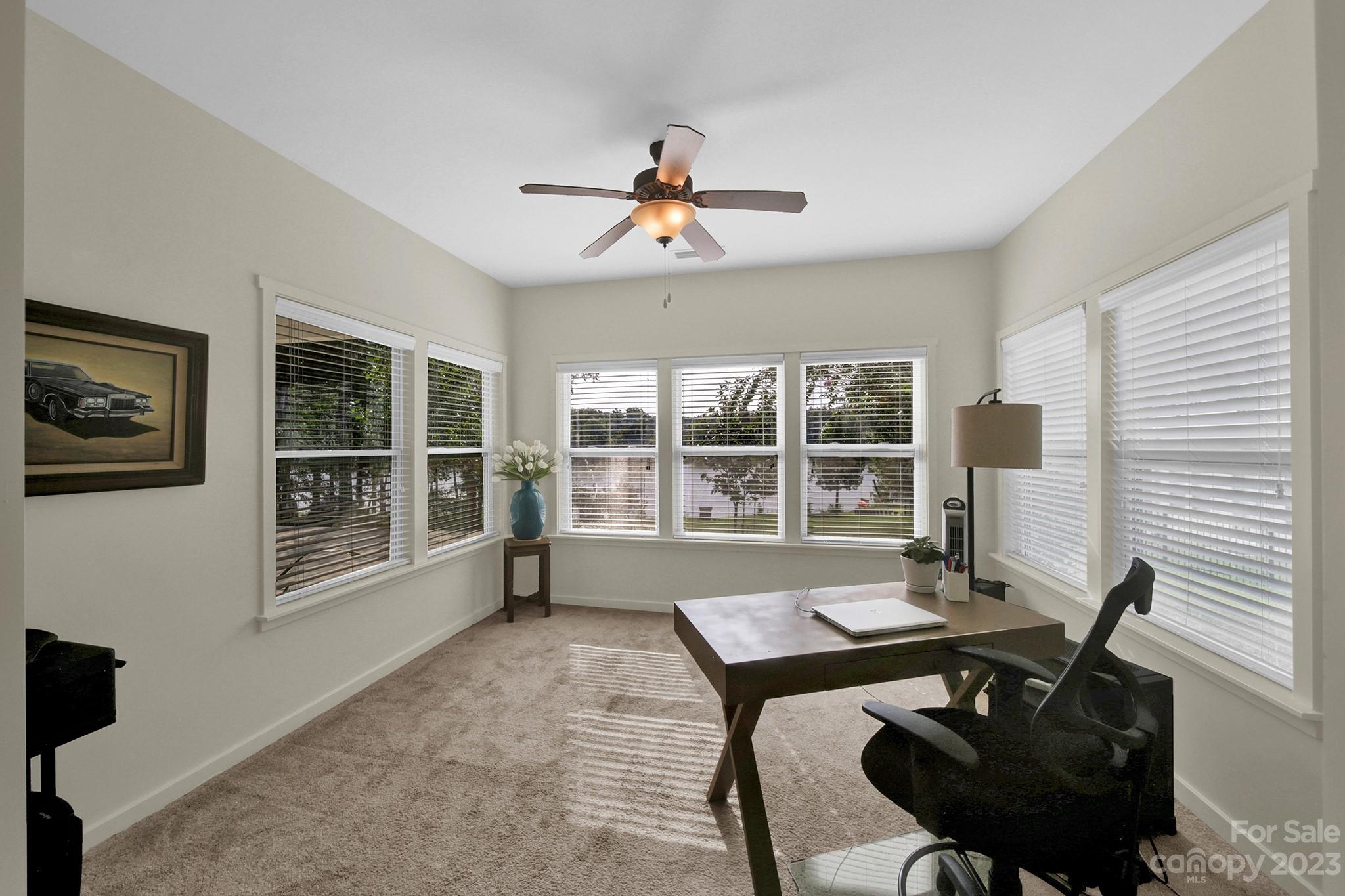 25554 Seagull Drive Lancaster, SC 29720 - Photo 20 of 33 a view of a workspace with furniture and a window