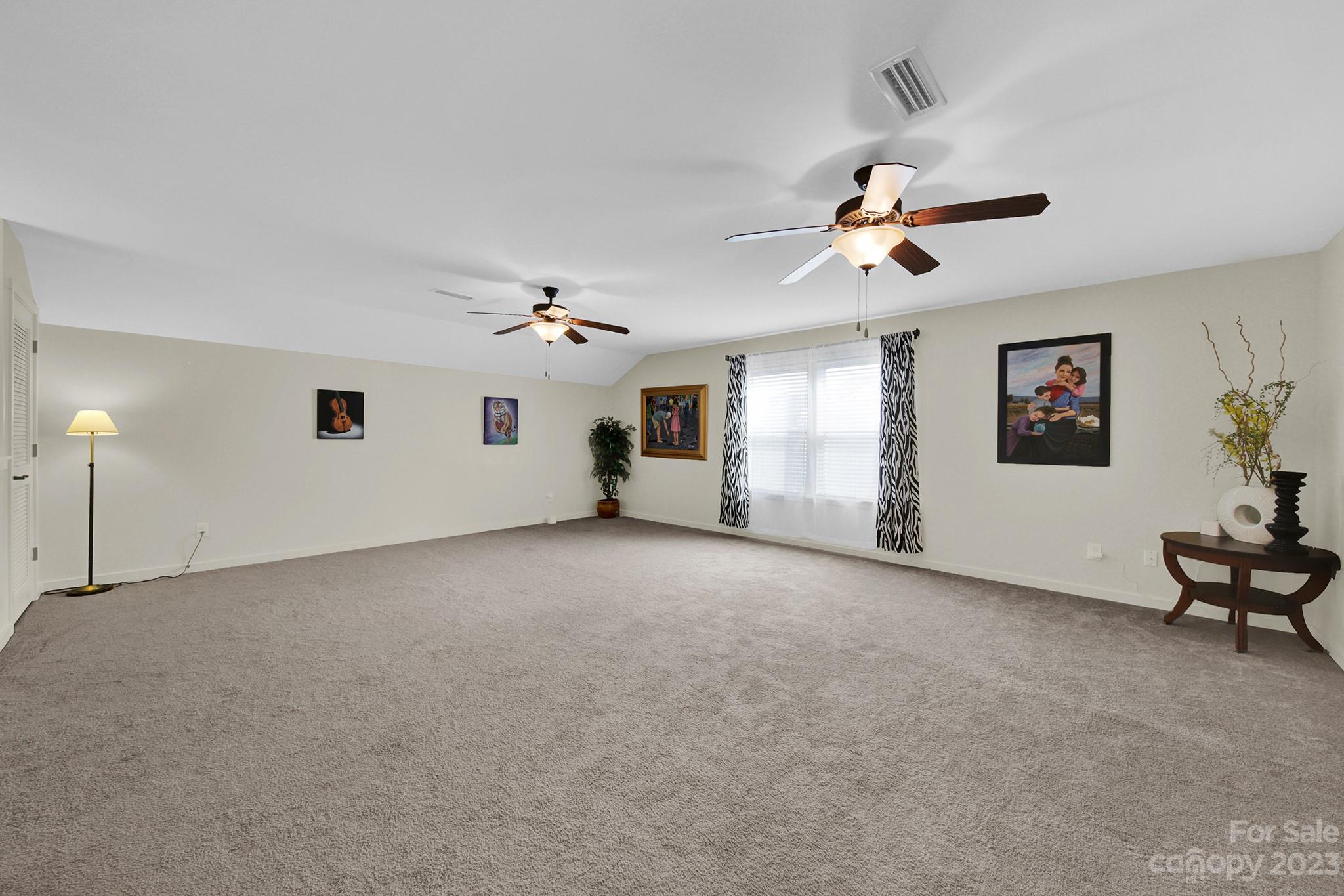 25554 Seagull Drive Lancaster, SC 29720 - Photo 24 of 33 a view of a livingroom with furniture and windows fan