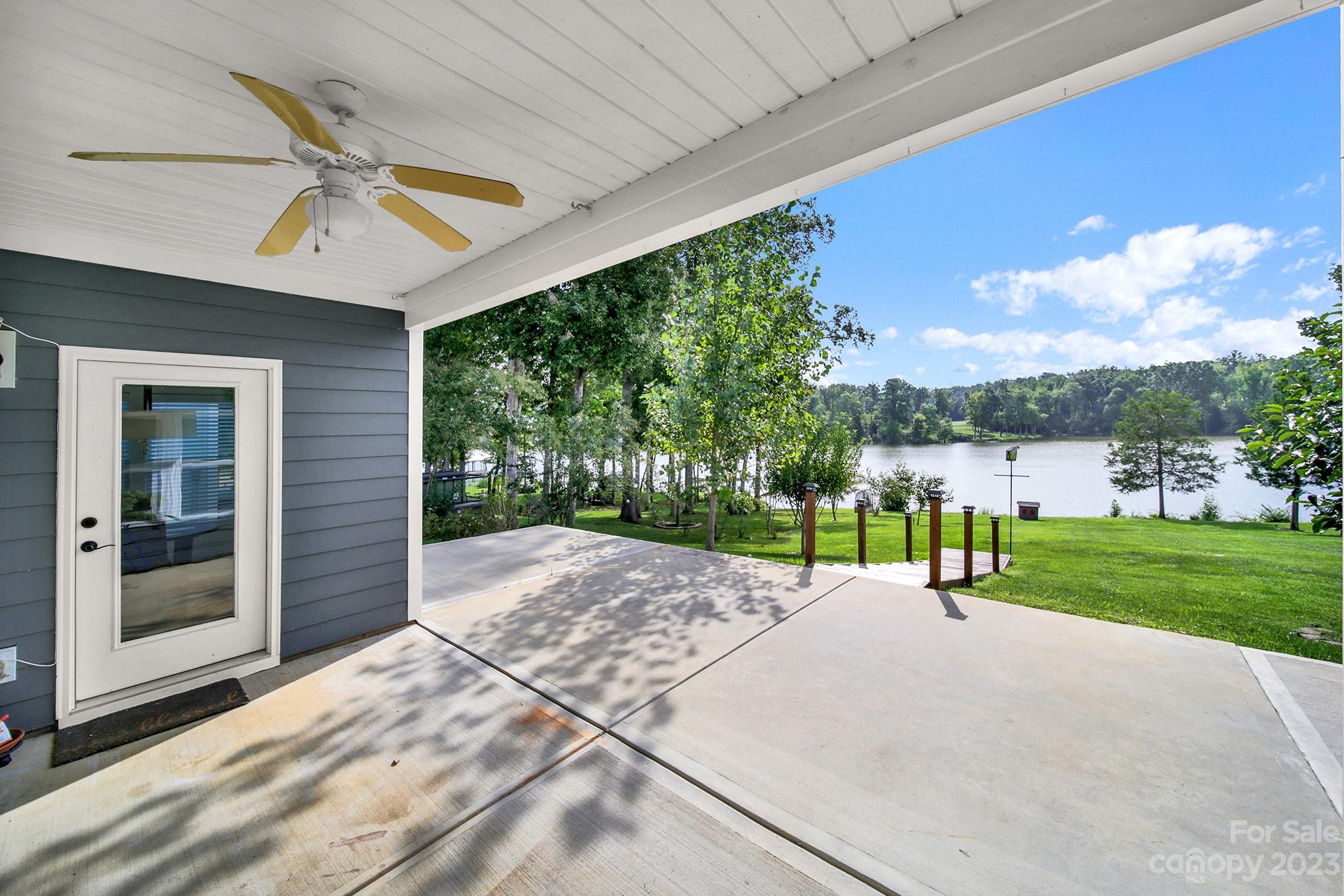 25554 Seagull Drive Lancaster, SC 29720 - Photo 29 of 33 a view of a house with a big yard and potted plants