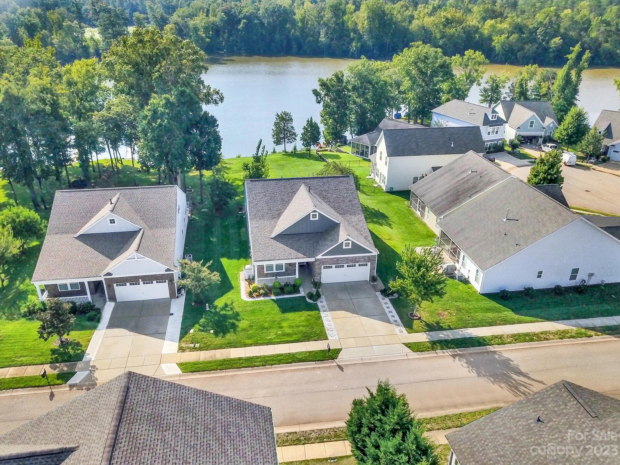 25554 Seagull Drive Lancaster, SC 29720 - Photo 3 of 33 an aerial view of a house with garden space and a street view