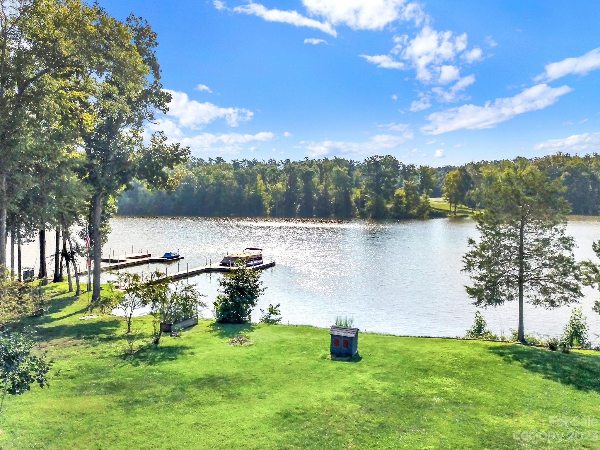 25554 Seagull Drive Lancaster, SC 29720 - Photo 32 of 33 a view of a lake in a garden