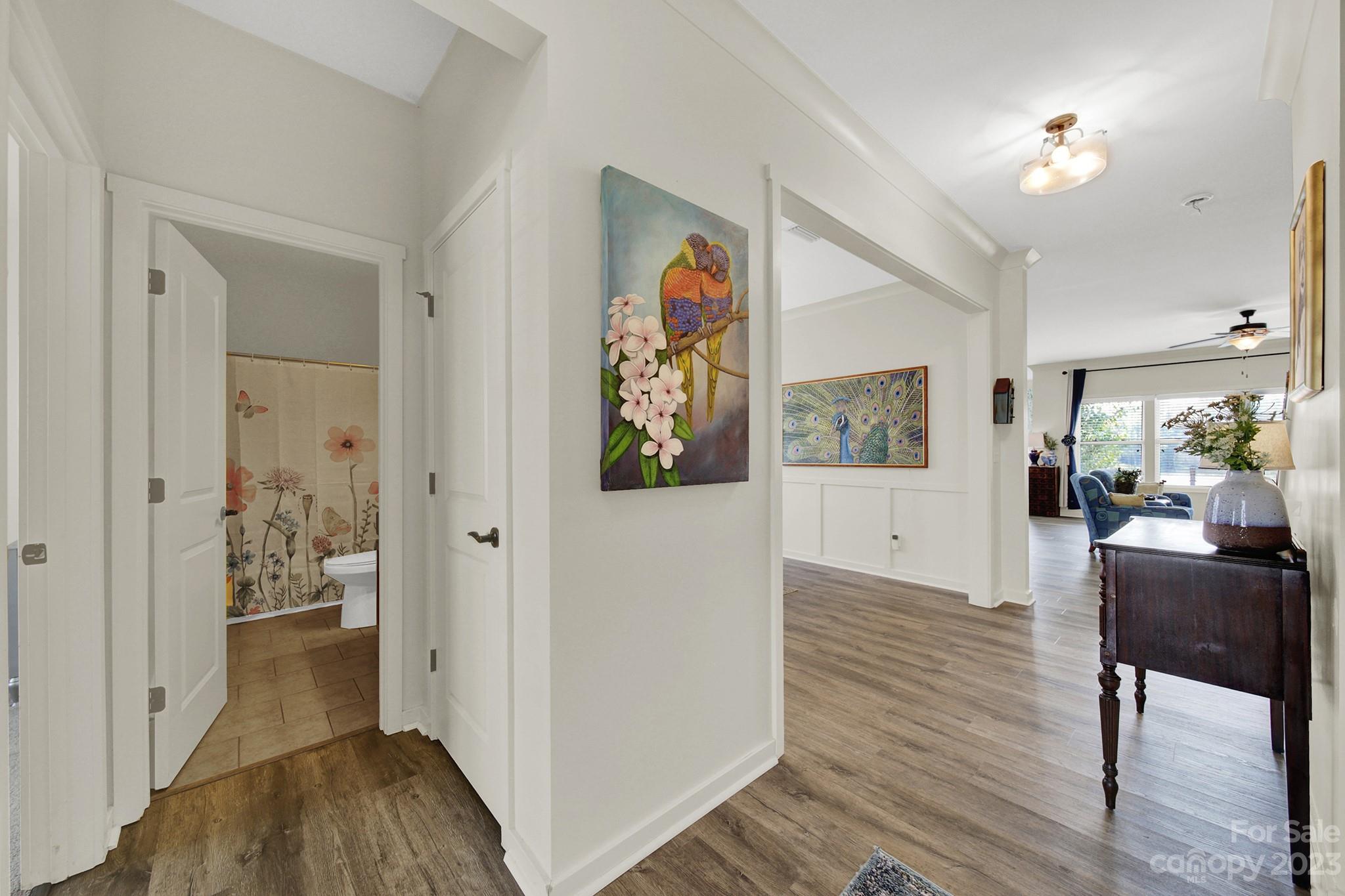 25554 Seagull Drive Lancaster, SC 29720 - Photo 5 of 33 a view of a hallway with wooden floor and livingroom view