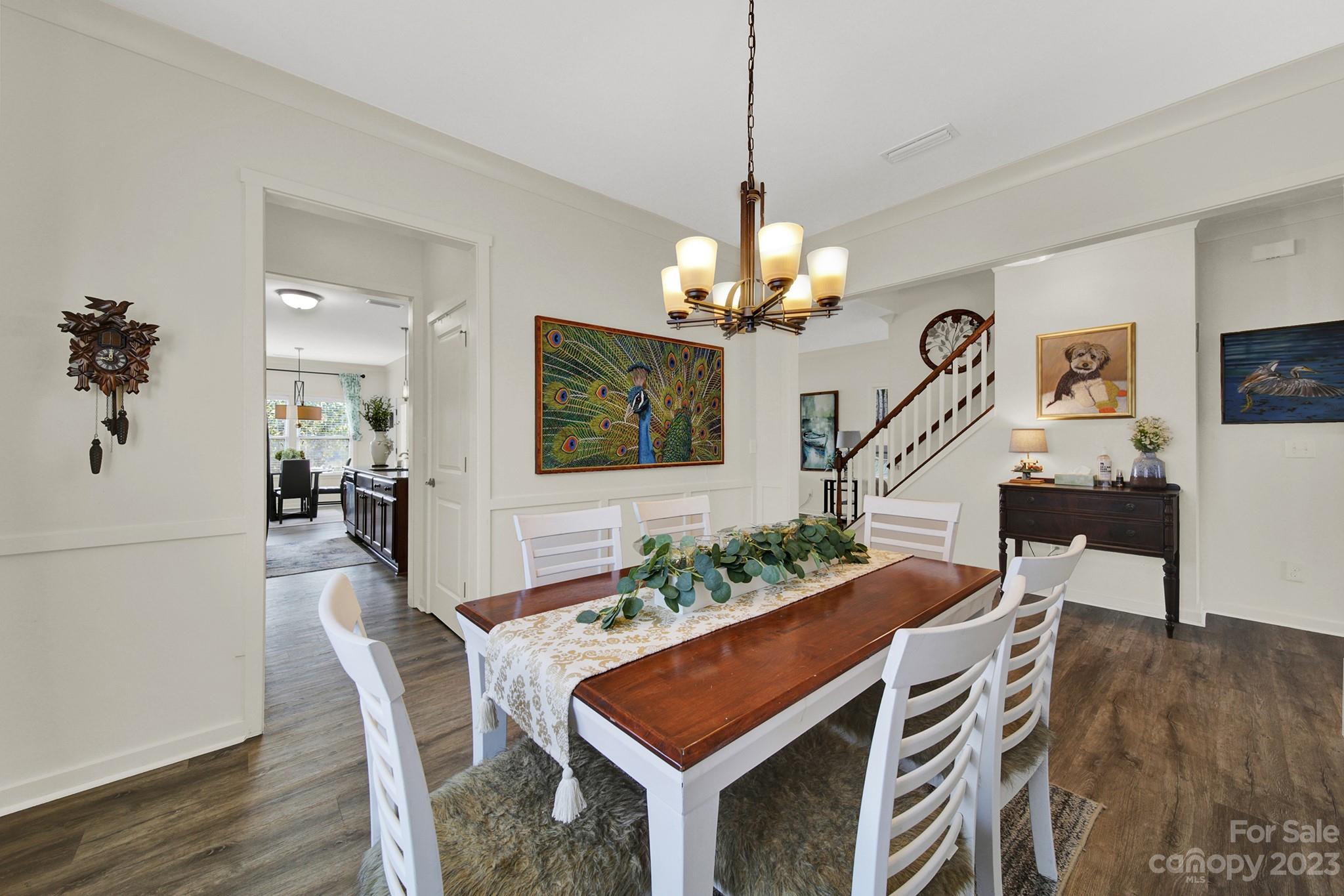25554 Seagull Drive Lancaster, SC 29720 - Photo 9 of 33 a view of a dining room with furniture and wooden floor