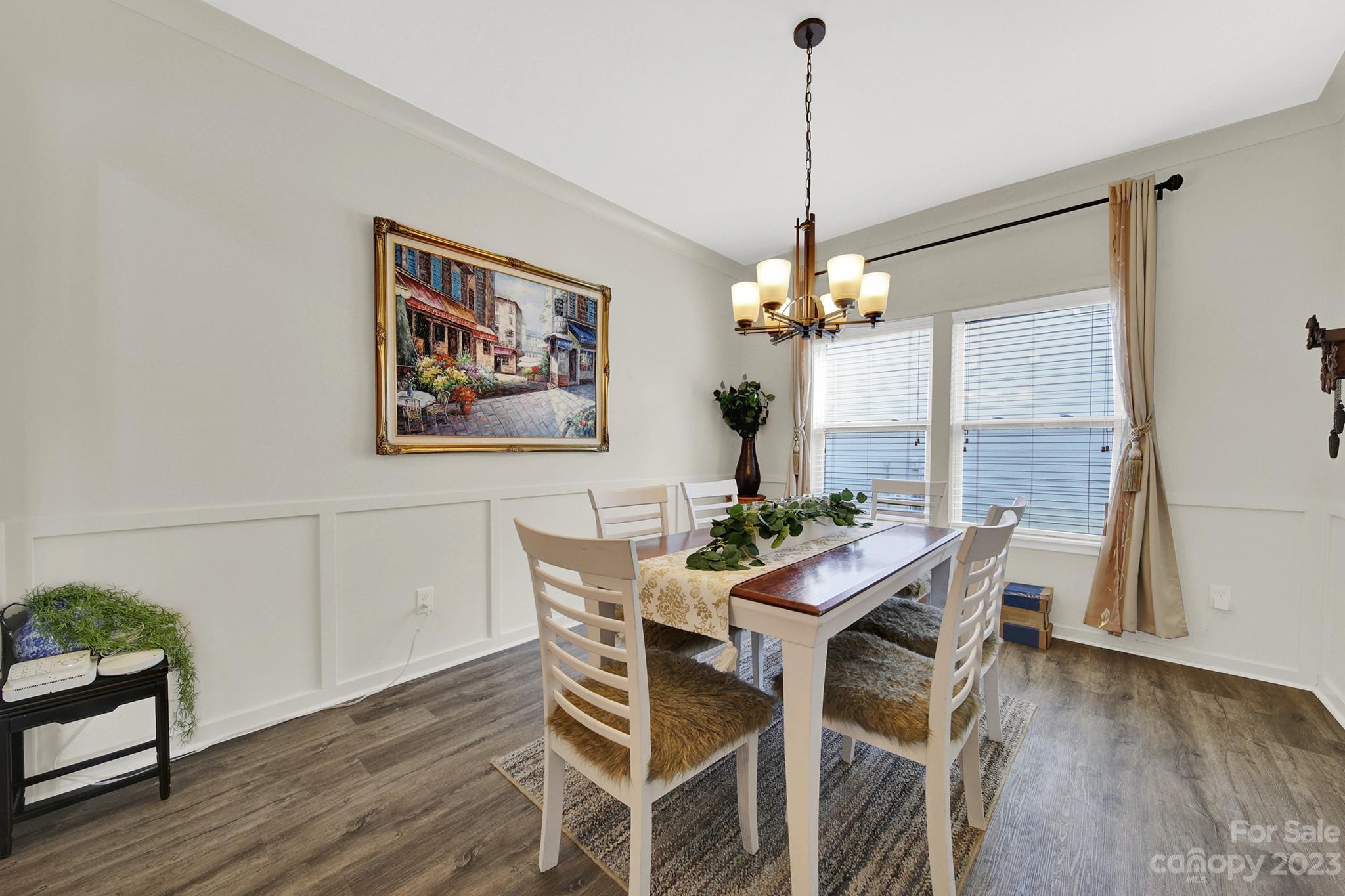 25554 Seagull Drive Lancaster, SC 29720 - Photo 10 of 33 a view of a dining room with furniture window and wooden floor