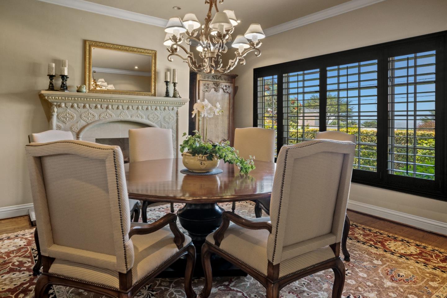 3017 Cormorant Road Pebble Beach, CA 93953 - Photo 12 of 42 a view of a dining room with furniture window and wooden floor