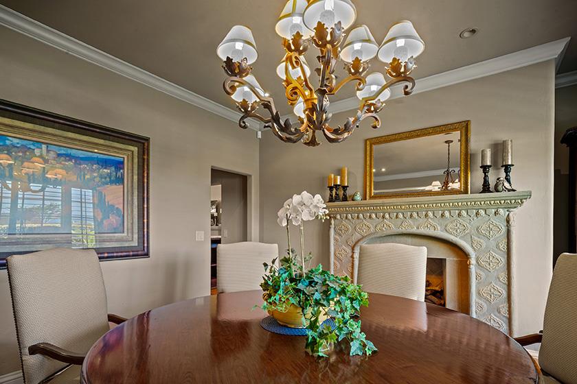 3017 Cormorant Road Pebble Beach, CA 93953 - Photo 13 of 42 a living room with furniture fireplace and chandelier