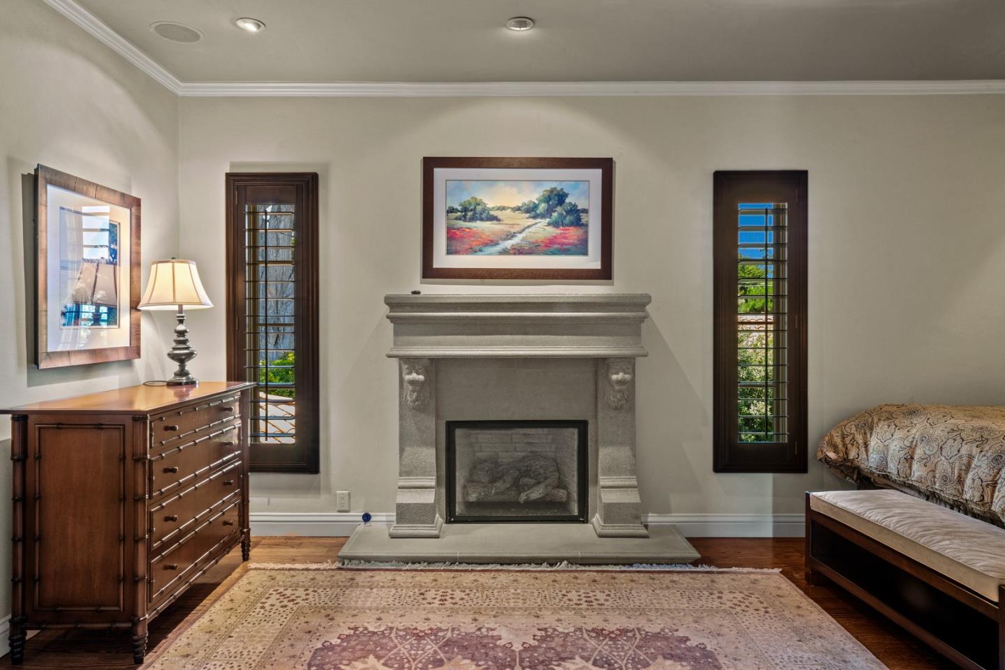 3017 Cormorant Road Pebble Beach, CA 93953 - Photo 25 of 42 a living room with furniture a window and a fireplace
