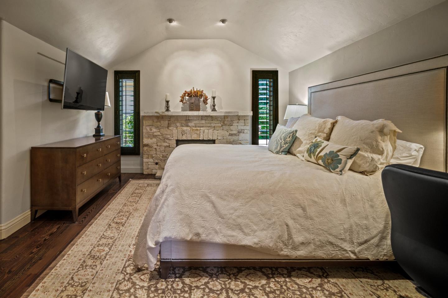 3017 Cormorant Road Pebble Beach, CA 93953 - Photo 30 of 42 a living room with furniture and a flat screen tv