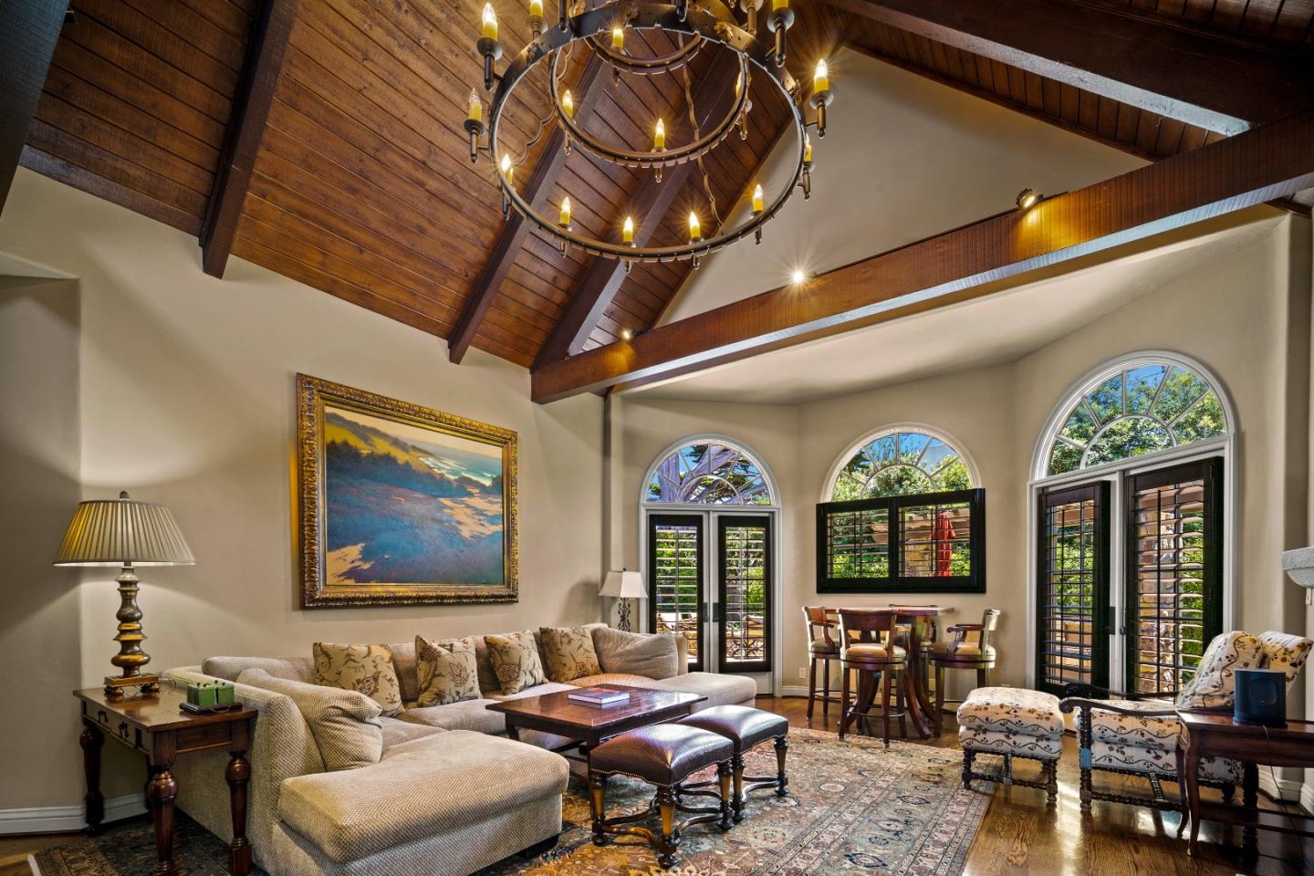 3017 Cormorant Road Pebble Beach, CA 93953 - Photo 3 of 42 a living room with furniture a chandelier and a large window