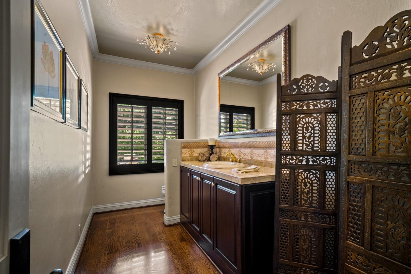3017 Cormorant Road Pebble Beach, CA 93953 - Photo 31 of 42 a kitchen with stainless steel appliances granite countertop a stove and a refrigerator